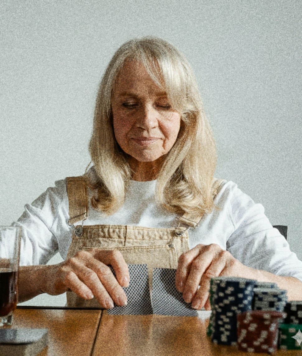 Blonde woman at a table with chips